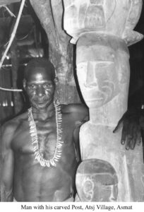 Asmat Man with Ancestor Post by Todd Barlin